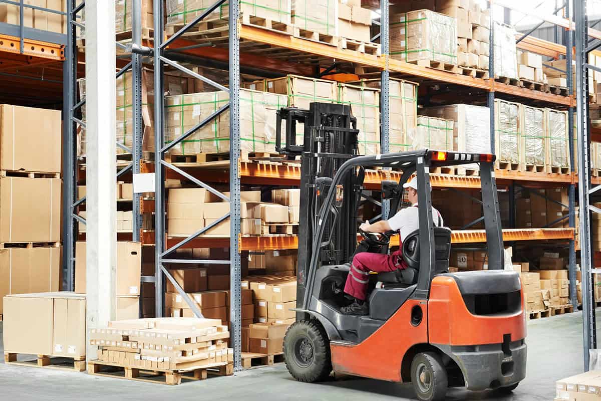 warehouse forklift performing distributor inventory management
