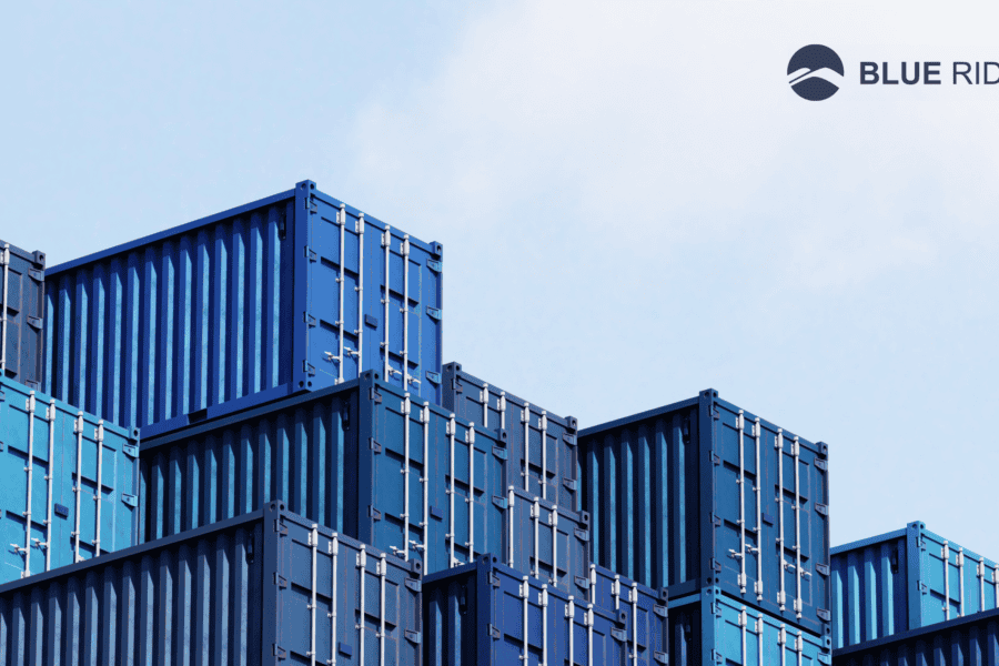 warehouse buildings representing global supply chain risk & uncertainly